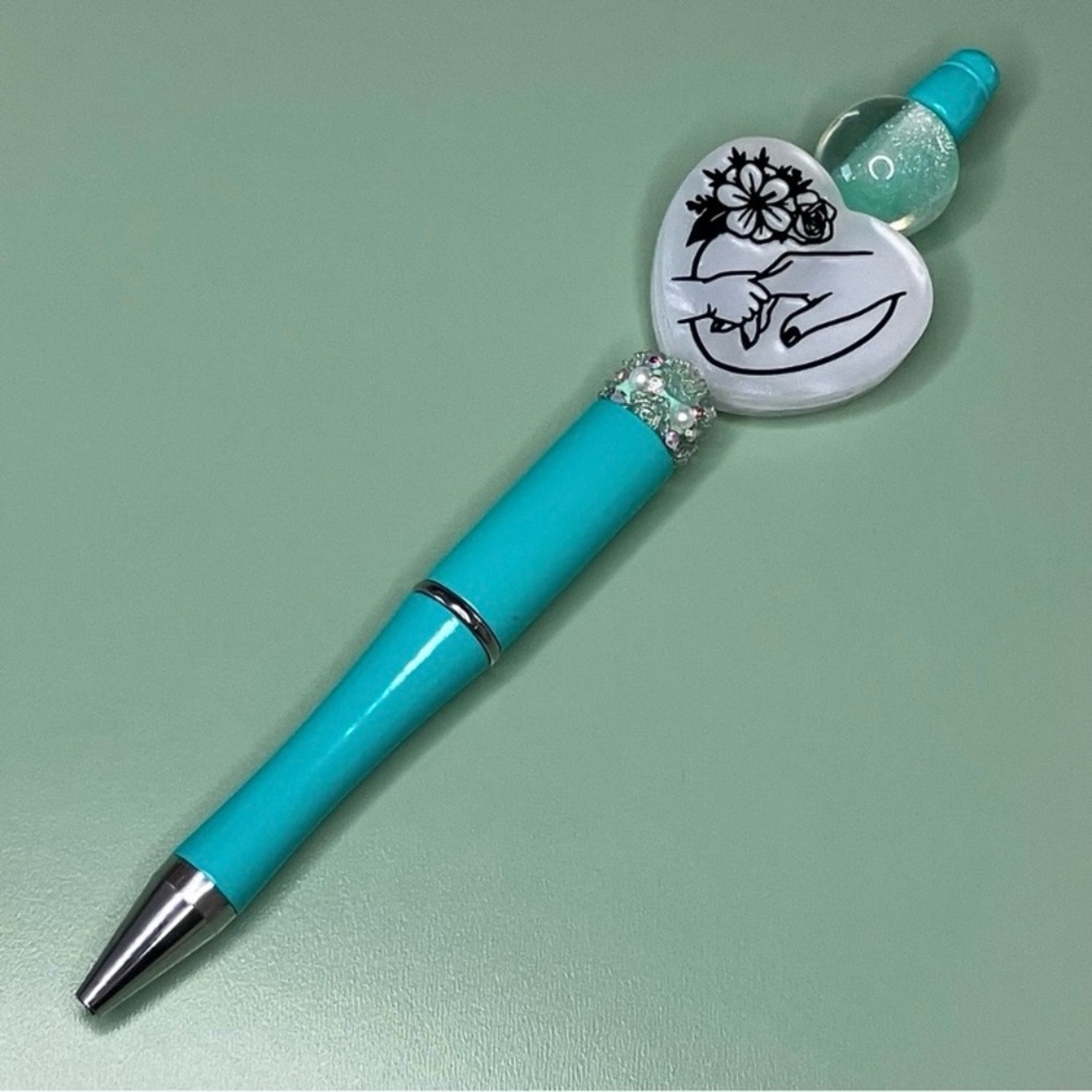 Teal and White Decorative Baby Holding Mother’s Hand Handmade Beaded Pen - Picture 4 of 5